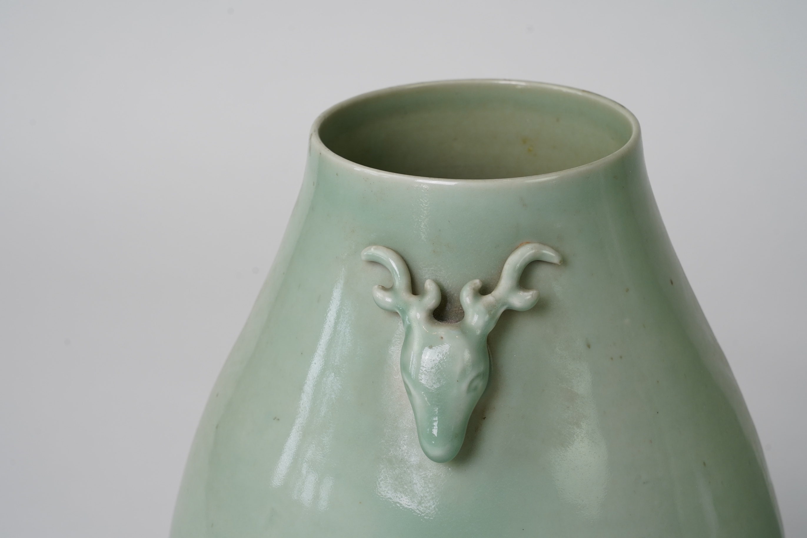 A pair of large Chinese celadon glazed ‘ hu’ vases, Yongzheng seal mark, 19th century